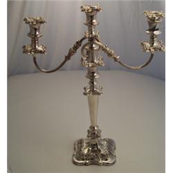 Pair of Sheffield plate two branch candelabra, each with centre sconces and with cast foliate bor...