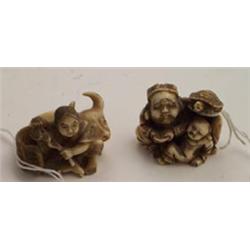 Japanese carved ivory netsuke of a seated figure with an ox, 1.5" wide Est.: £100 -150...