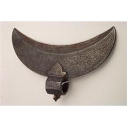 19th Century Indo-Persian steel axe head, the crescent shaped blade with engraved foliate decorat...