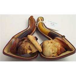 Meerschaum pipe, the carved bowl depicting King Edward VII with amber mouth piece in original kid...