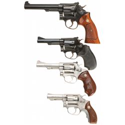Four Smith & Wesson Double Action Revolvers