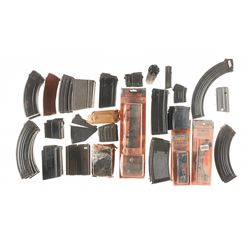 Large Lot of Assorted Magazines Seven Pouches and a Holster