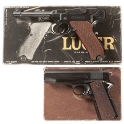 Two Boxed Semi-Automatic Pistols