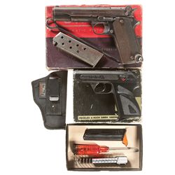 Two Boxed Semi-Automatic Pistols