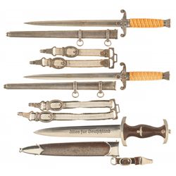 Three German Daggers, Including a Damascus Pattern Heer Dagger with Golden Inscription