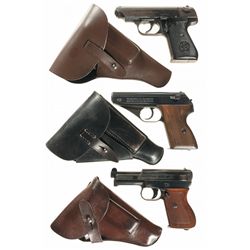 Three German Semi-Automatic Pistols with Holsters and Extra Magazines