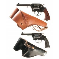 Two Colt Double Action Revolvers with Holsters