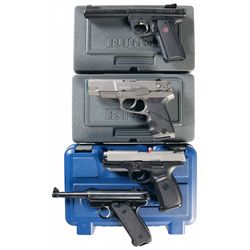 Four Semi-Automatic Pistols with Cases