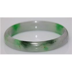 CHINESE WHITE AND GREEN JADE BANGLE; DIAMETER 2.7 IN