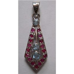 3.340g Pendant of Ruby and Blue topaz in silver