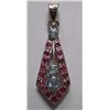 Image 1 : 3.340g Pendant of Ruby and Blue topaz in silver