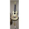 Image 1 : Plastic Folk Art Smaller Guitar as is