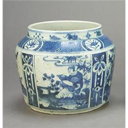 A Chinese jar, of squat form with slightly flared sides and decorated in underglaze blue with pan...