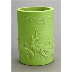 A green-glazed brushpot carved with the eight horses of Mu Wang (wood stand), 15cm, mark of Li Yu...