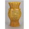 Image 1 : A brown-glazed vase of lobed baluster form carved with a landscape panel on one side and an eagle...