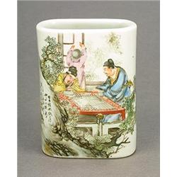 A 'famille-rose' brushpot dated 1941, of cylindrical form painted on one side with two scholars p...