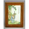 Image 1 : A famille-rose plaque depicting Budai standing under a pine tree, 18cm, framed and glazed (see il...