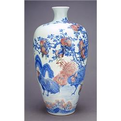 A large copper-red and underglaze blue vase, , of meiping form, boldly painted with a group of co...