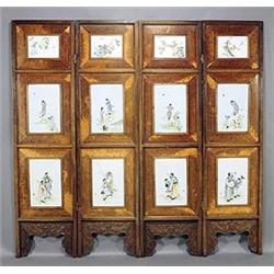 A porcelain-mounted four-fold screen, each panel consists of three rectangular plaques inset into...