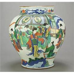 A large Chinese jar, decorated in underglaze blue in Transitional style with figures, rocks and p...