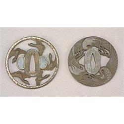 A Japanese iron and gilt Tsuba pierced and cast with five ducks in flight within a gild diaper bo...