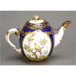 A Sevres bleu nouveau ground oviform teapot and cover (theiere calabre), painted with two gilt-li...