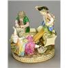 Image 1 : A Meissen (outside decorated) group of three children at play, modelled amonst ruined columns, on...