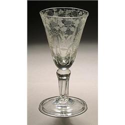 A Dutch-engraved pedestal-stemmed goblet, the funnel bowl with broad vertical flutes and engraved...