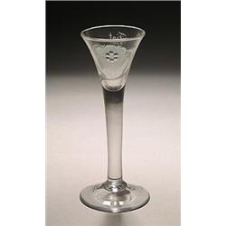 A plain-stemmed wine or cordial glass of Jacobite significance, the drawn trumpet bowl engraved a...