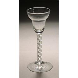An airtwist wine glass, the pan-topped bowl supported on a stem with a multi-ply spiral cable, on...