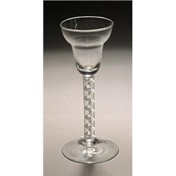 An airtwist wine glass, the pan-topped bowl supported on a stem with a multi-ply spiral cable, on...