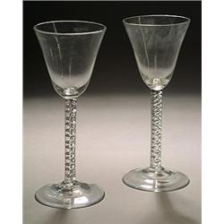 A pair of airtwist wine glasses, the broad funnel bowls supported on a stem with a double mercury...