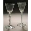 Image 1 : A pair of airtwist wine glasses, the broad funnel bowls supported on a stem with a double mercury...