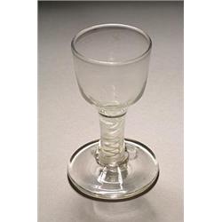 An engraved airtwist firing glass, the ogee bowl supported on a double series stem and substantia...