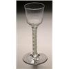 An opaque-twist wine glass, the ogee bowl with hammered lower section, on a double series stem an...
