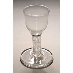 An opaque-twist firing glass, with ogee bowl supported on a double series stem and substantial ci...