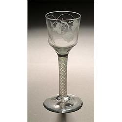 An engraved opaque-twist wine or ale glass, the ogee bowl with a hop sprig and ears of barley, su...