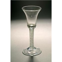 An opaque-twist wine glass, the bell bowl with a solid lower section and tear inclusions, support...