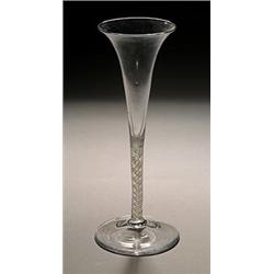 An opaque-twist toasting glass, of typical drawn trumpet form, on a double series stem and a coni...