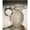 Image 1 : A cut water jug, oviform with flared neck, cut with a central band of fine diamonds between bands...