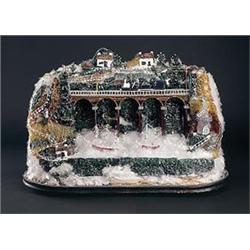 A large coloured and clear frigger of a seaside town, modelled with a locomotive travelling along...