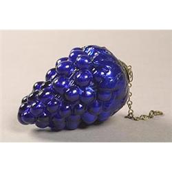 A French press-moulded cobalt-blue cased glass Christmas decoration naturalistically formed as a...