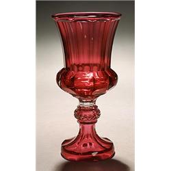 A Bohemian ruby-flashed goblet, the fluted thistle-shaped bowl supported on a knopped stem cut wi...