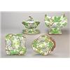 A Staffordshire pearlware part dessert service, printed in manganese and painted in green and bro...