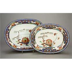 A Turner's Patent ironstone oval meat plate with gravy well, painted in under-glaze blue, iron-re...