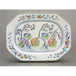 An English ironstone octagonal tureen stand, printed in blue and painted in colours with an exoti...