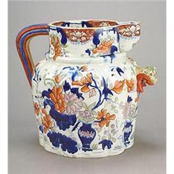 A Mason's Ironstone china footbath jug, the lobed bulbous body surmounted by a cylindrical neck w...