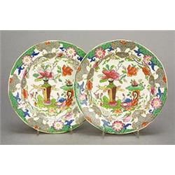 A pair of Mason's Patent Ironstone China tea plates, enamelled in colours with a table and vase p...