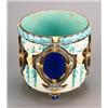 Image 1 : A Wedgwood majolica jardiniere, moulded in relief in the Baroque manner with a band of oval panel...