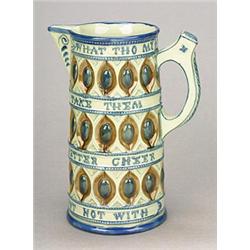 A Wedgwood majolica 'Caterer' jug, of typical form, painted with coloured glazes in shades of blu...